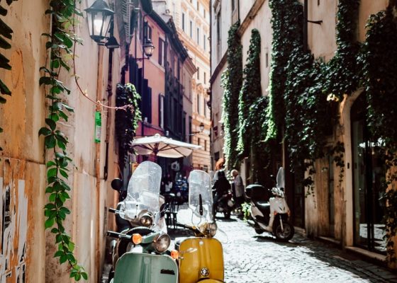 Scooters on the street in Rome photo by Andrei Mike, Unsplash