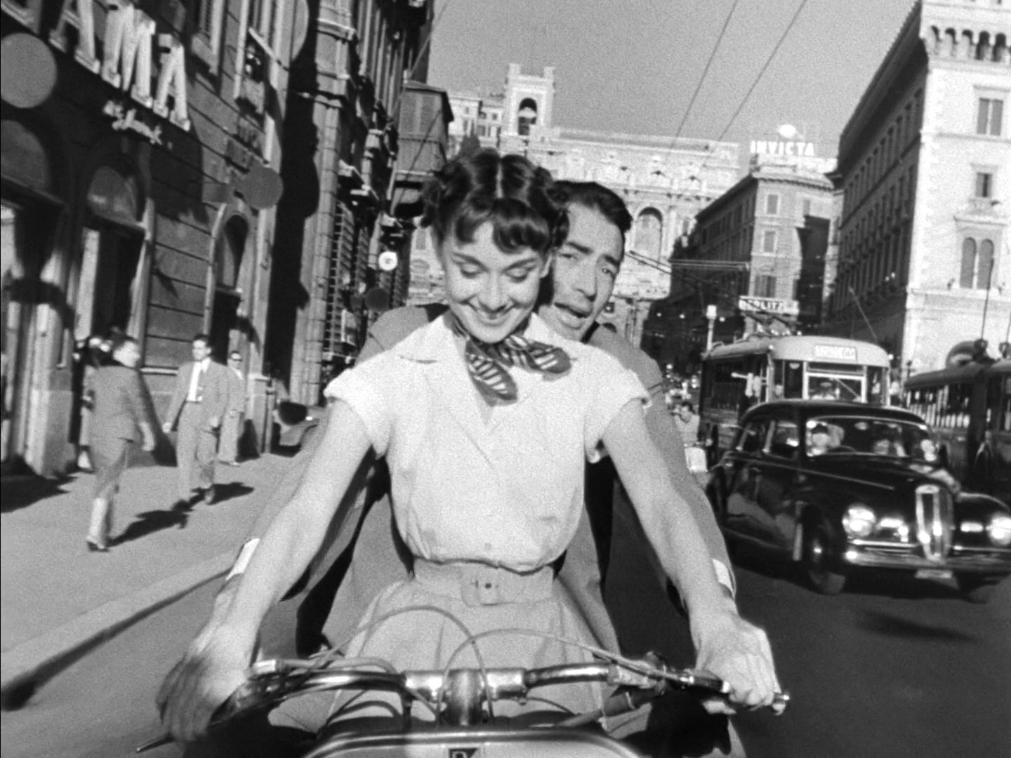 Audrey Hepburn and Gregory Peck from the trailer for the film Roman Holiday. Image from WikiMedia Commons
