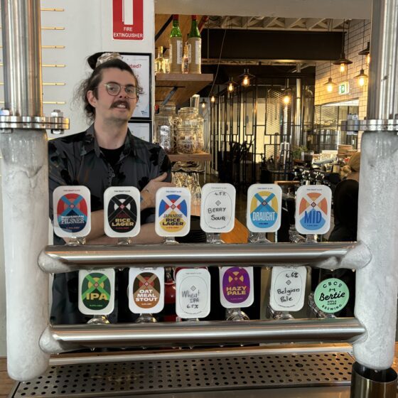 The Craft & Co’s friendly bartender and taps. Photograph: Mark Ferguson