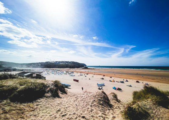 a beach with a lot of people on it