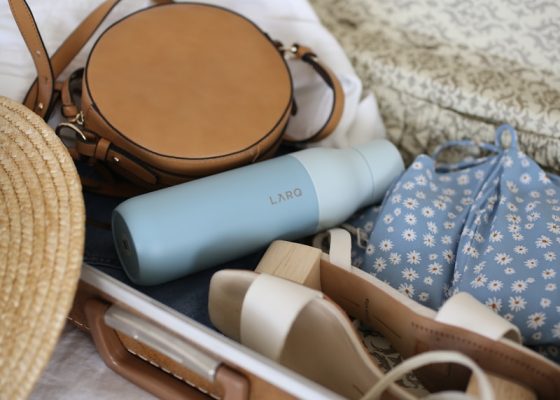 brown and gray leather suitcase