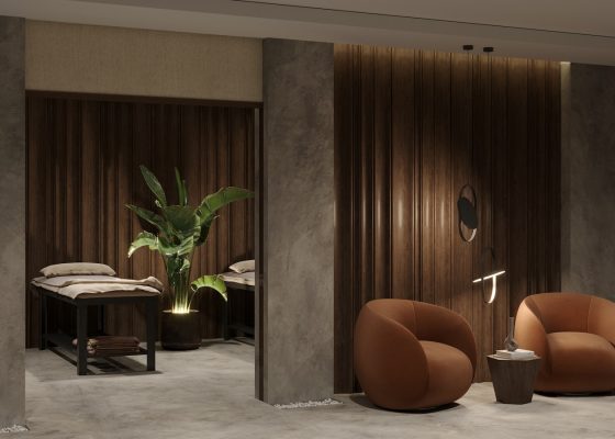 a couple of chairs sitting next to each other in a room